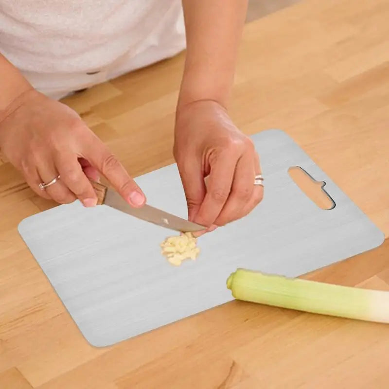 The Heavy-Duty Stainless Board (Thickened Non-Stick Cutting Board)